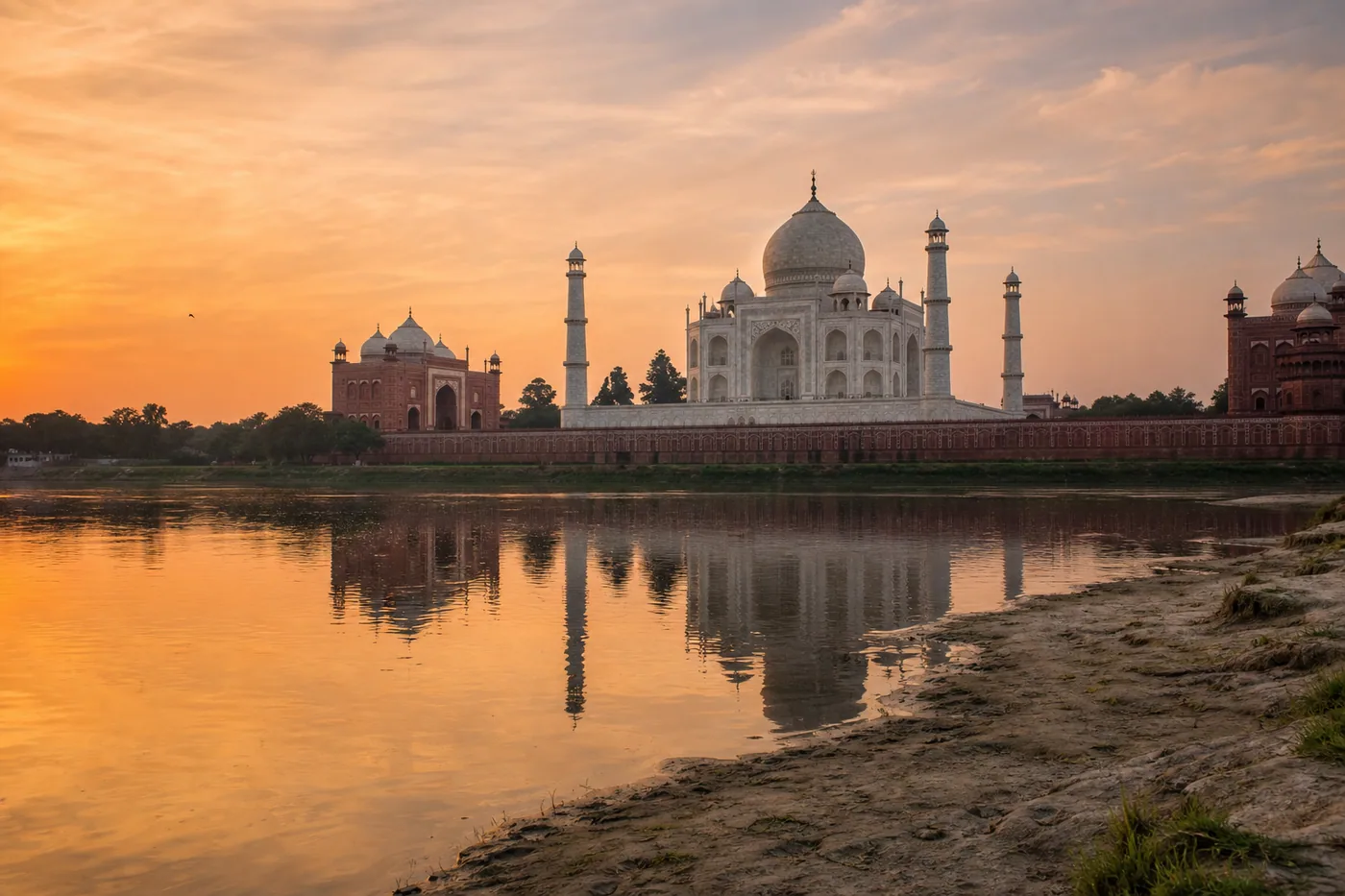Taj Mahal viewed across the Yamuna River at sunset